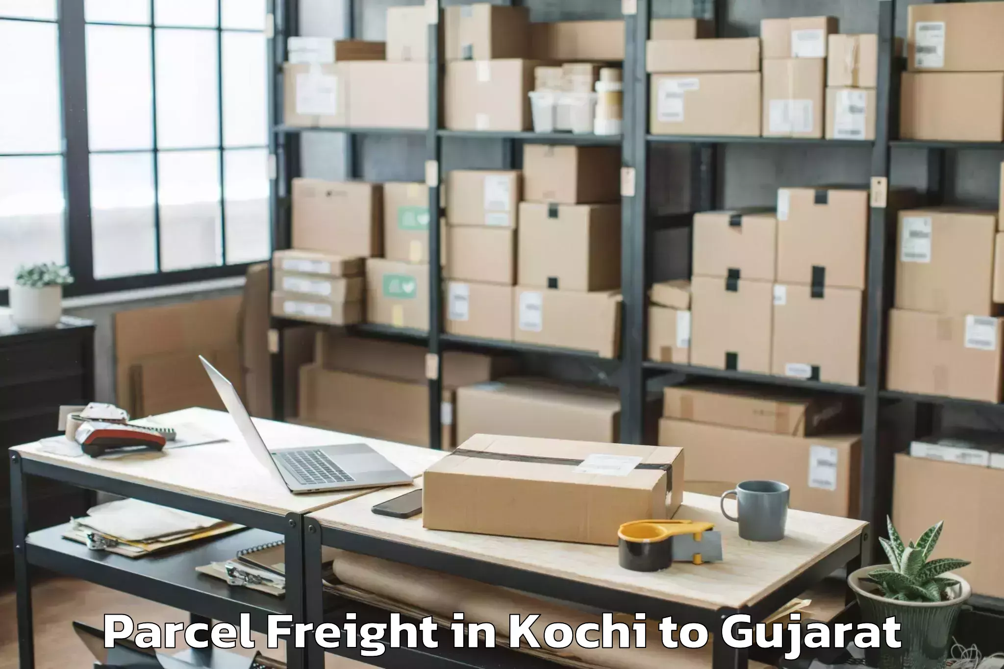 Top Kochi to Dhanera Parcel Freight Available